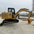 2022 Caterpillar 305.5E2 mini excavator, side profile view