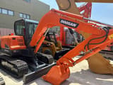 2022 Doosan DX55 mini excavator, side profile view