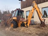 1988 CASE 680K backhoe loader, side view