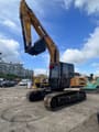 2024 Sany 215CPRO Crawler Excavator showing the full machine with its yellow boom and black cab.