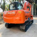 2023 Hitachi ZAXIS 60 crawler excavator, rear three-quarter view