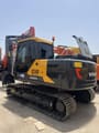 2022 Volvo EC140 crawler excavator, rear three-quarter view