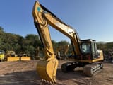 2020 Caterpillar 320DL Raupenbagger, Front-Dreiviertelansicht