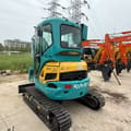 2021 Kubota U35 mini excavator, rear three-quarter view