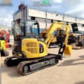 Komatsu PC55MR-2 mini excavator, rear three-quarter view