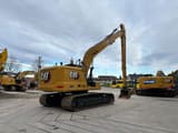 2022 Caterpillar 323 SLR excavator, rear three-quarter view