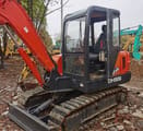 Doosan DH55 crawler excavator, side view