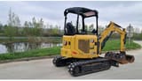 2023 Caterpillar 302.7 crawler excavator, rear three-quarter view