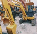 Komatsu PC30MR mini excavator, front three-quarter view