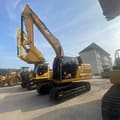 2024 Caterpillar 320CL paletli ekskavatör, yan profil görünüm