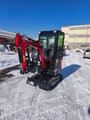 2025 Captok CK13 mini excavator from a rear three-quarter view, with the boom and arm folded close to the cab.