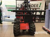 2024 Schäffer 2028-2 mini excavator, front view with attachment