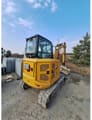2022 Caterpillar 304 crawler excavator rear three-quarter view