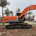 Hitachi Zaxis 200 crawler excavator, side view