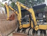 2018 Caterpillar 302C mini excavator, front three-quarter view