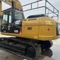 2020 Caterpillar 329D crawler excavator, rear three-quarter view