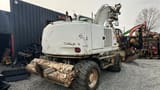 2005 CASE WX165 wheel excavator, rear three-quarter view