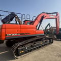 2023 Doosan DX300LCA crawler excavator, rear three-quarter view