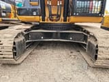 Caterpillar 330D crawler excavator undercarriage view