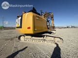 2017 Caterpillar 326F HDHW crawler excavator, rear three-quarter view