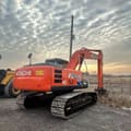 2018 Hitachi Zaxis 200 crawler excavator, rear three-quarter view
