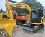 2024 Komatsu PC70-8 mini excavator, front three-quarter view