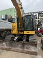 2016 Caterpillar 315FLCR crawler excavator front view with blade