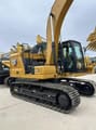 2023 Caterpillar 320GC crawler excavator, side view