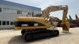 2020 Caterpillar 320CL paletli ekskavatör, yandan görünüm