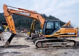Case CX240B crawler excavator, side view