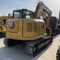Caterpillar 308E2 mini excavator, rear three-quarter view