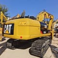 2024 Caterpillar 320D2 crawler excavator, rear three-quarter view