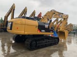 2023 Caterpillar 325DL crawler excavator, rear three-quarter view