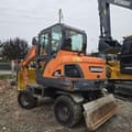 2018 Doosan DX60W wheel excavator, rear three-quarter view