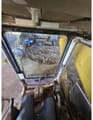 1992 Komatsu PC210LC crawler excavator operator cab interior view
