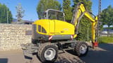 2013 Wacker Neuson 9503 wheel excavator, rear three-quarter view