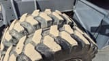 2021 Takeuchi TB295W wheel excavator dual tires close-up