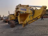 2024 Komatsu PC210 crawler excavator, front three-quarter view