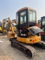 2025 Caterpillar 303.5E mini excavator rear three-quarter view