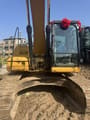 2012 Caterpillar 323DL crawler excavator front view
