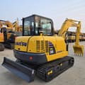 2024 Komatsu PC56 mini excavator, rear three-quarter view