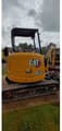 2020 Caterpillar 303.5E CR crawler excavator, rear three-quarter view