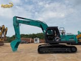 Kobelco SK200 crawler excavator, side view