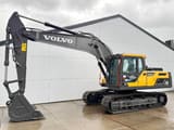 2025 Volvo EC220D Crawler Excavator showing the full length of the dark grey boom and arm.
