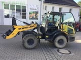 2021 New Holland W50C mini excavator, side view