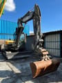 2021 Volvo ECR88D mini excavator, front three-quarter view