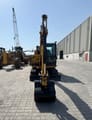 2023 Caterpillar 305.5E2 mini excavator, front view