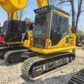 Komatsu PC130 crawler excavator, side view
