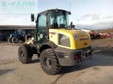 2023 New Holland W80C mini excavator, rear three-quarter view