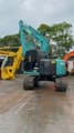 2015 Kobelco SK135SR crawler excavator, rear three-quarter view